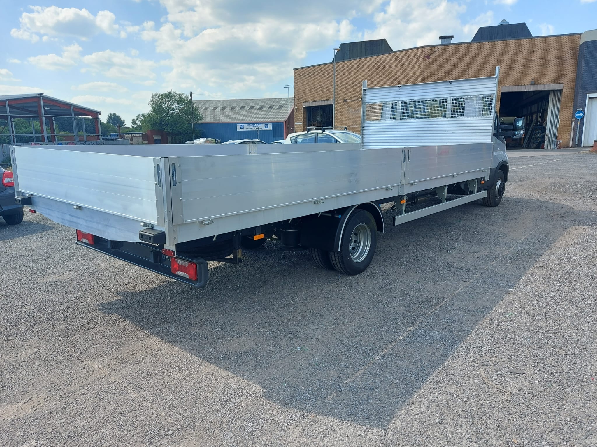 Dropside Bodies - Professional multi-compartment commercial vehicle body with individual access doors